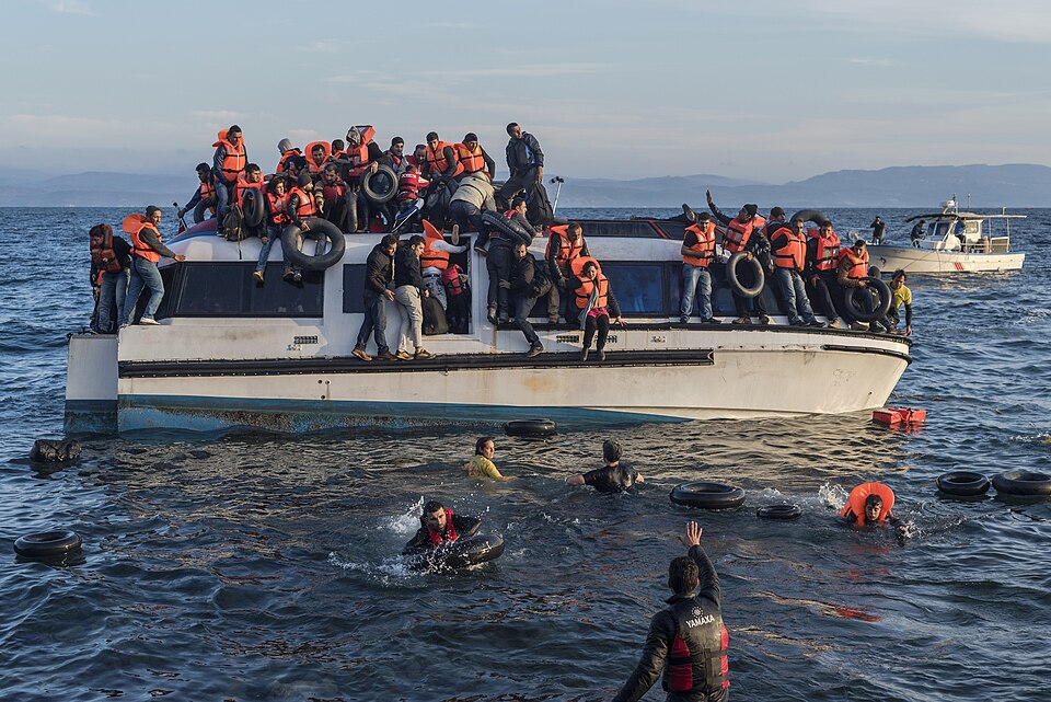 A crowded boat at sea
