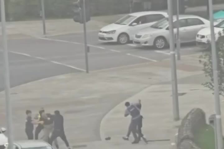 A street confrontation at Citywest with a Garda car nearby